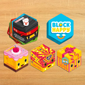 Block Happy cards laid on a wooden table